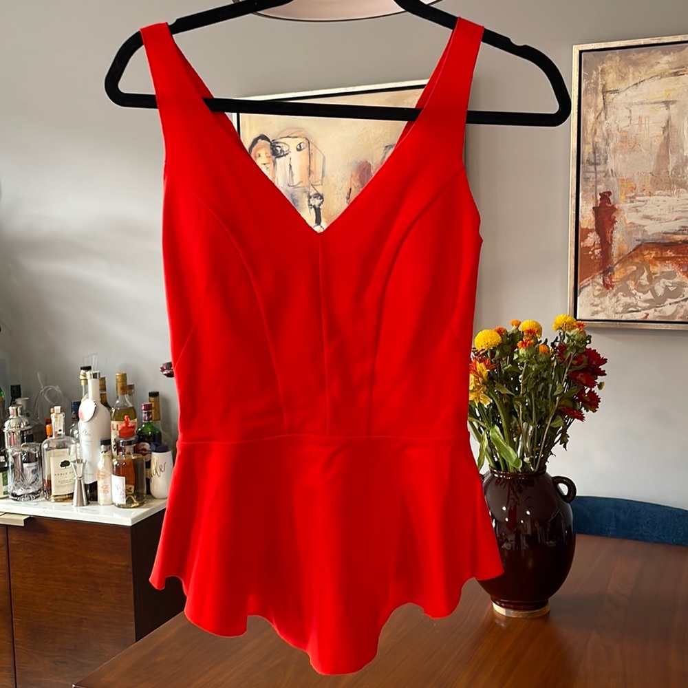 Intermix v neck sleeveless peplum top. Red. Small.